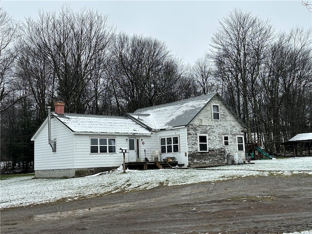 view of front of property featuring a wooden deck