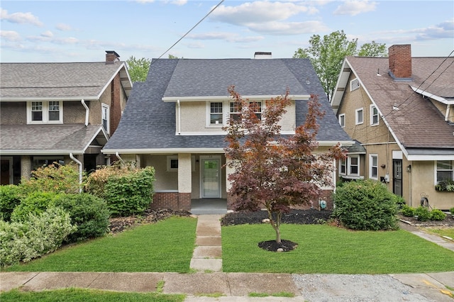 view of front of property with a front yard