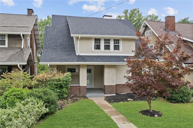 view of front of house with a front yard