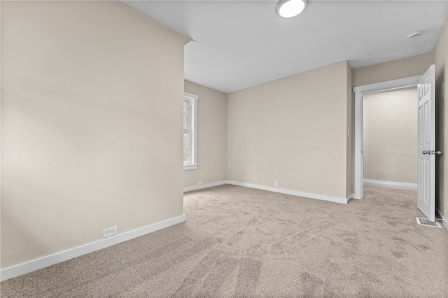 view of carpeted spare room