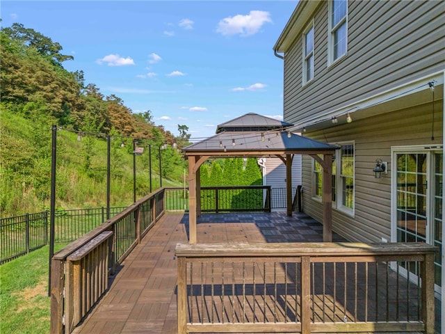 wooden deck with a gazebo