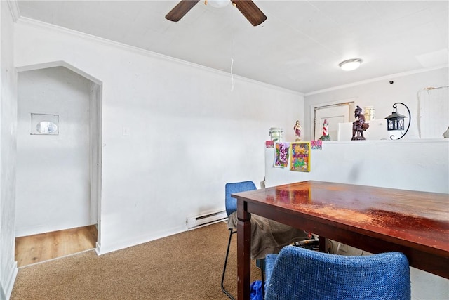 interior space featuring ceiling fan, ornamental molding, and baseboard heating