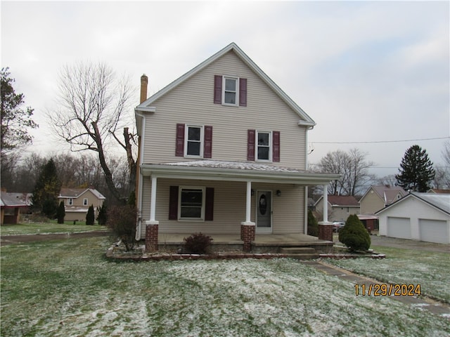 front of property with covered porch and a front lawn