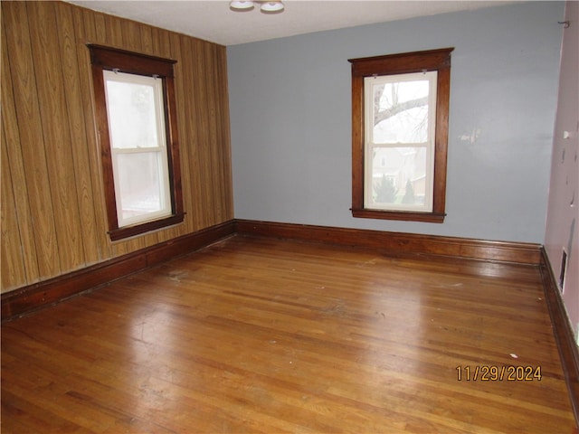 unfurnished room with light hardwood / wood-style floors