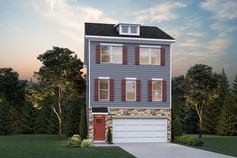 view of front of property featuring a lawn and a garage