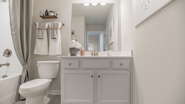 full bathroom featuring tile patterned flooring, vanity, toilet, and shower / bath combo with shower curtain