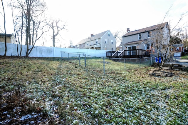 view of yard featuring a wooden deck