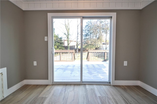 entryway with light hardwood / wood-style flooring