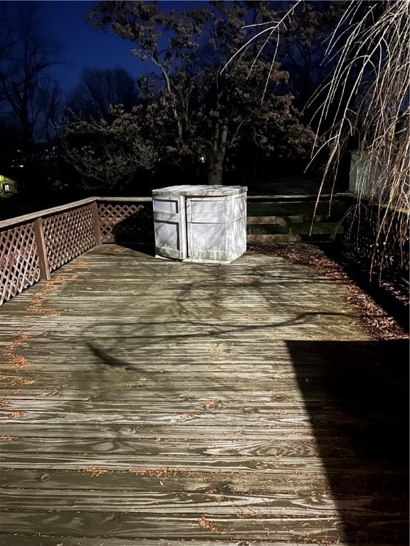 view of deck at twilight