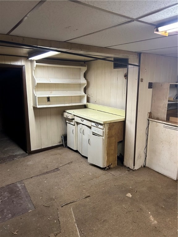 basement with wooden walls