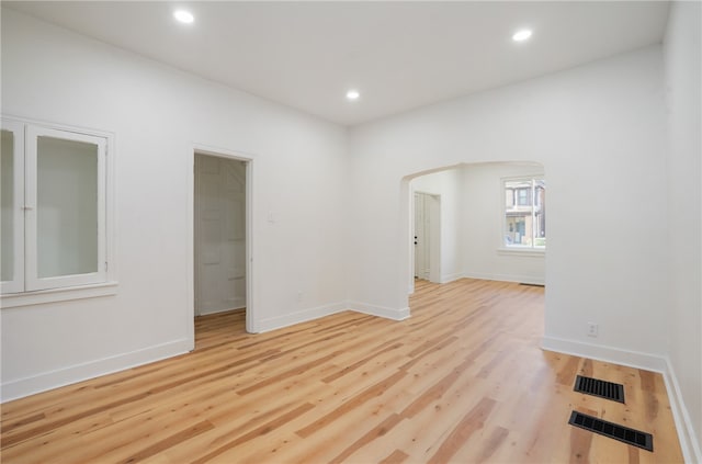 empty room with light wood-type flooring