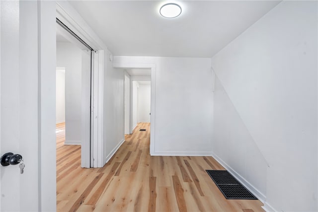 hall featuring light wood-type flooring