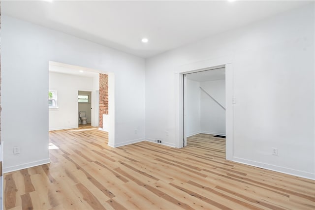 unfurnished room featuring light hardwood / wood-style flooring