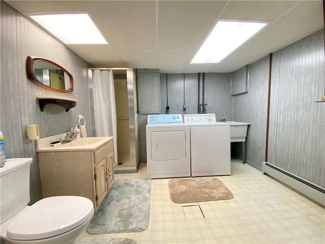 3240 E Lake Rd, Shenango, PA 16134 - washroom with washer and clothes dryer, light floors, and a baseboard radiator