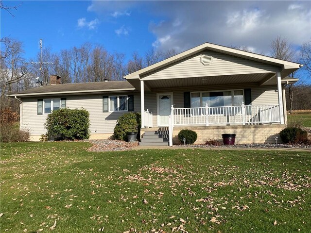 3240 E Lake Rd, Shenango, PA 16134 - ranch-style home with a porch, a front yard, and a chimney