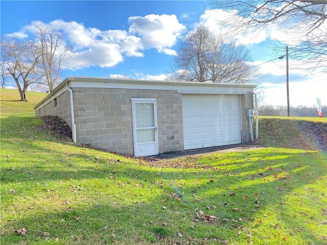 garage with a yard