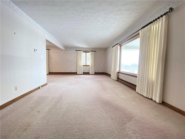 3240 E Lake Rd, Shenango, PA 16134 - unfurnished room featuring a textured ceiling and light colored carpet