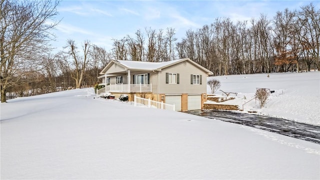 3240 E Lake Rd, Shenango, PA 16134 - view of front of home with a porch and a garage