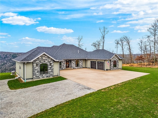 ranch-style house with a front yard and a garage