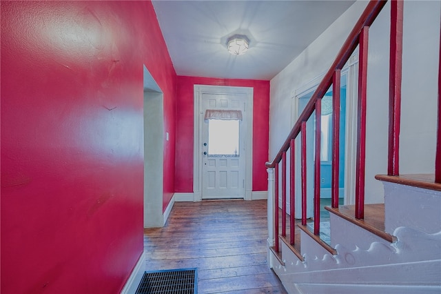 entrance foyer with hardwood / wood-style floors