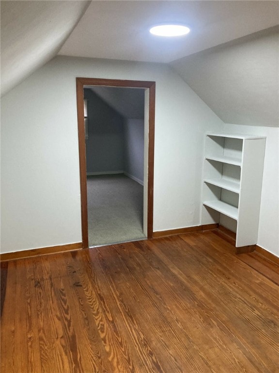 bonus room featuring hardwood / wood-style floors and vaulted ceiling