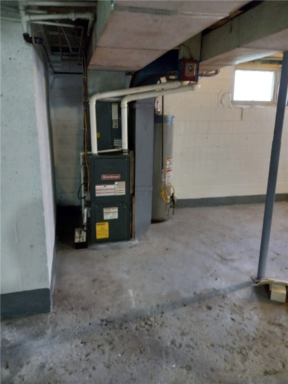 basement with heating unit and water heater