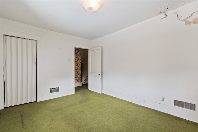 unfurnished bedroom with carpet flooring