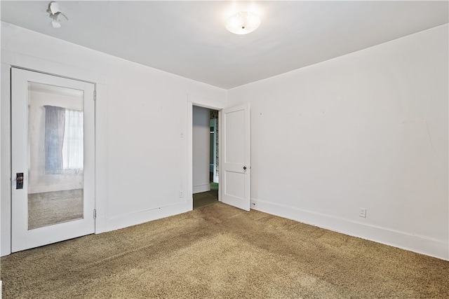 spare room with carpet flooring