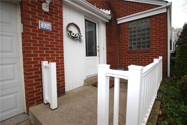 property entrance featuring a porch