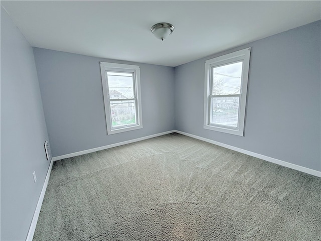 view of carpeted spare room