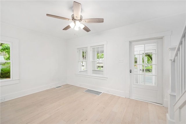 interior space featuring ceiling fan and light wood-type flooring