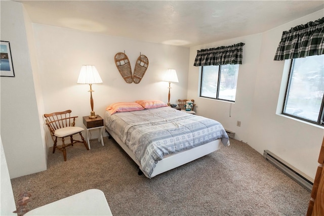 carpeted bedroom with a baseboard radiator