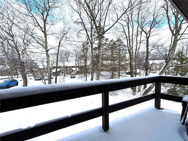 view of snow covered deck