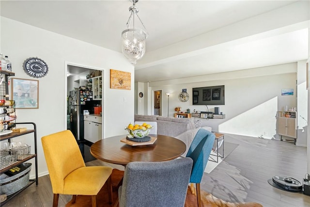 dining area featuring dark hardwood / wood-style flooring