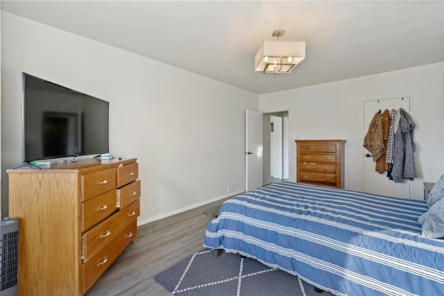 bedroom featuring hardwood / wood-style flooring