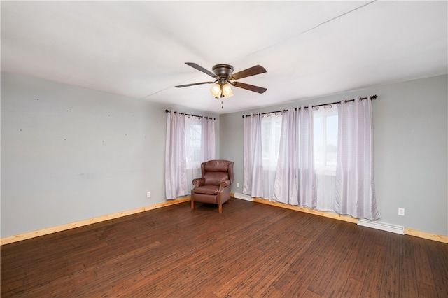 unfurnished room featuring hardwood / wood-style floors and ceiling fan