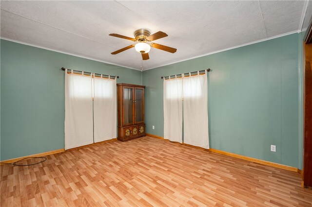 unfurnished bedroom featuring a textured ceiling, light wood-type flooring, ceiling fan, and ornamental molding