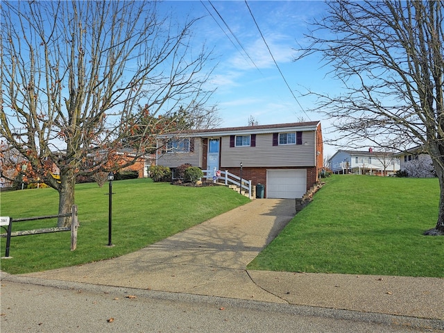 raised ranch with a front yard and a garage