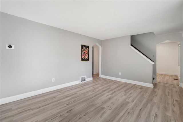 unfurnished living room featuring light hardwood / wood-style flooring