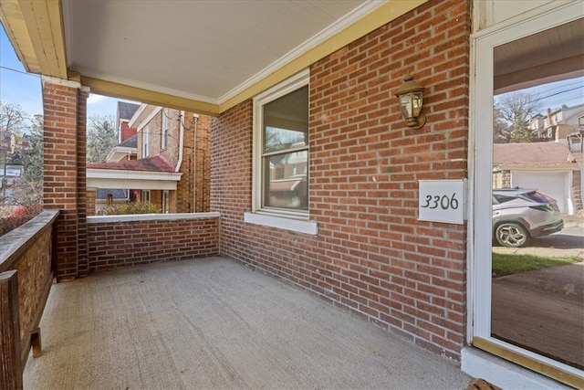 balcony featuring a porch