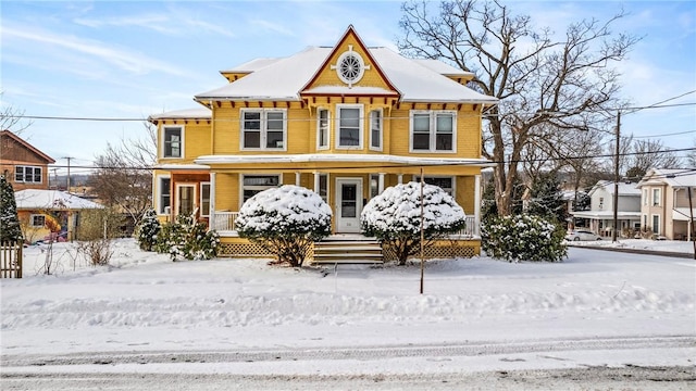 victorian home featuring a porch