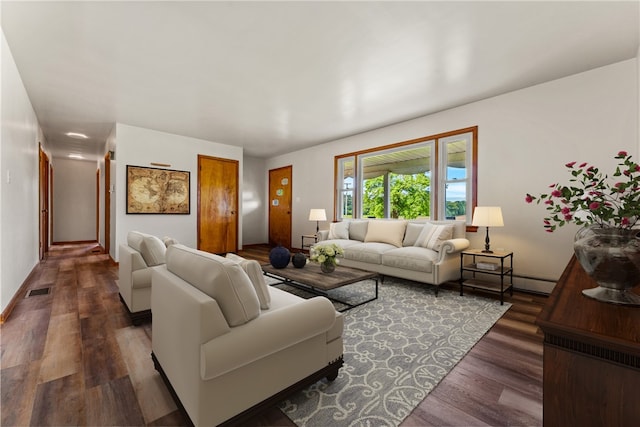 living room featuring dark hardwood / wood-style floors