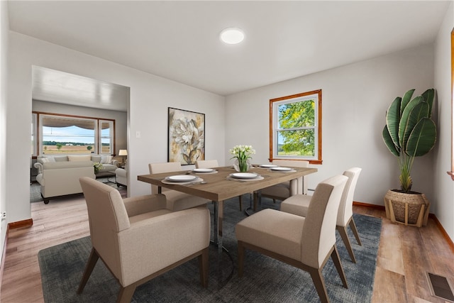 dining area featuring light hardwood / wood-style floors