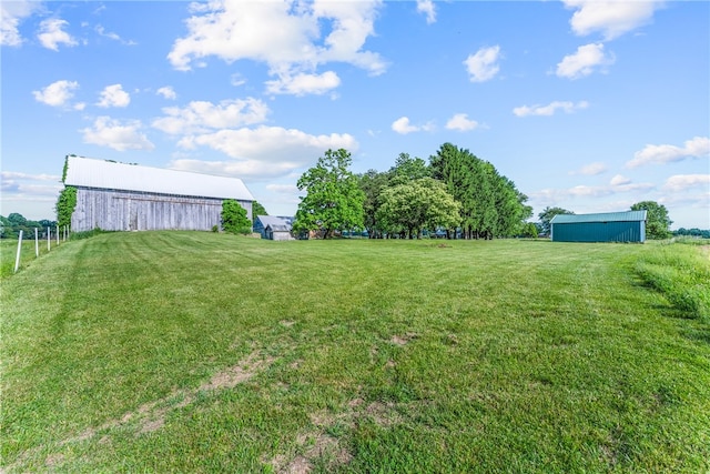 view of yard with an outdoor structure