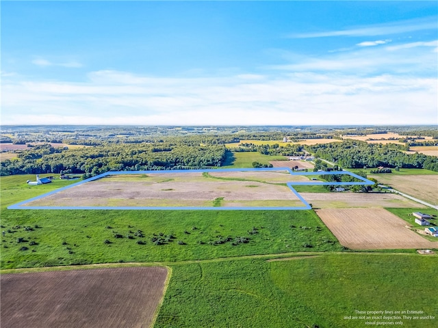 birds eye view of property with a rural view