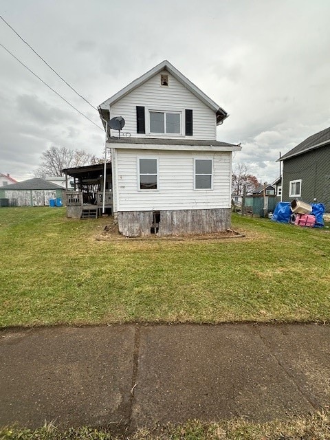 view of property exterior with a yard