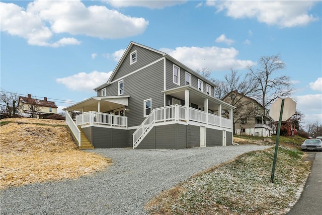 view of side of property with a porch