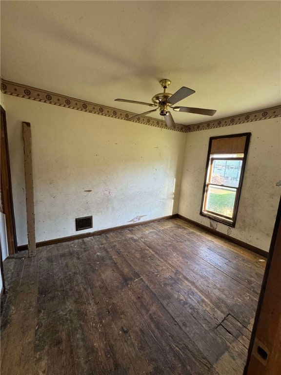 unfurnished room featuring hardwood / wood-style flooring and ceiling fan