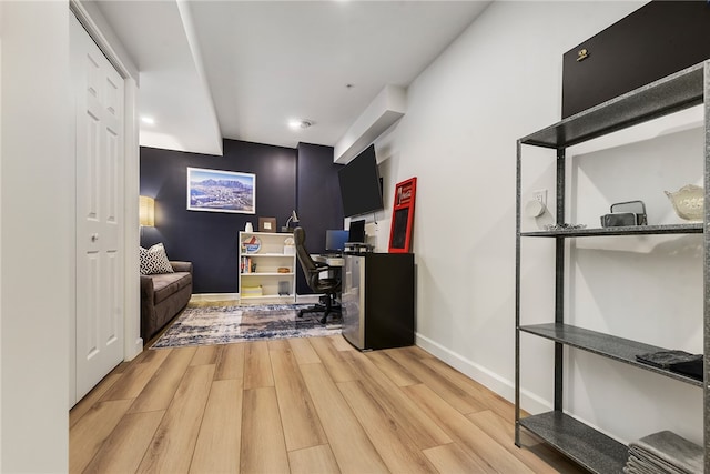 office area with hardwood / wood-style flooring