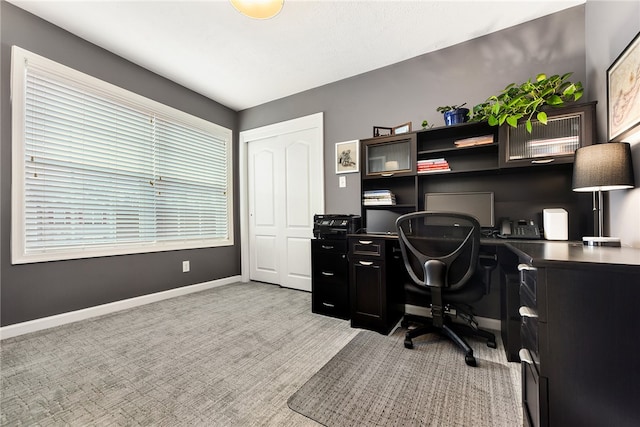 view of carpeted office space